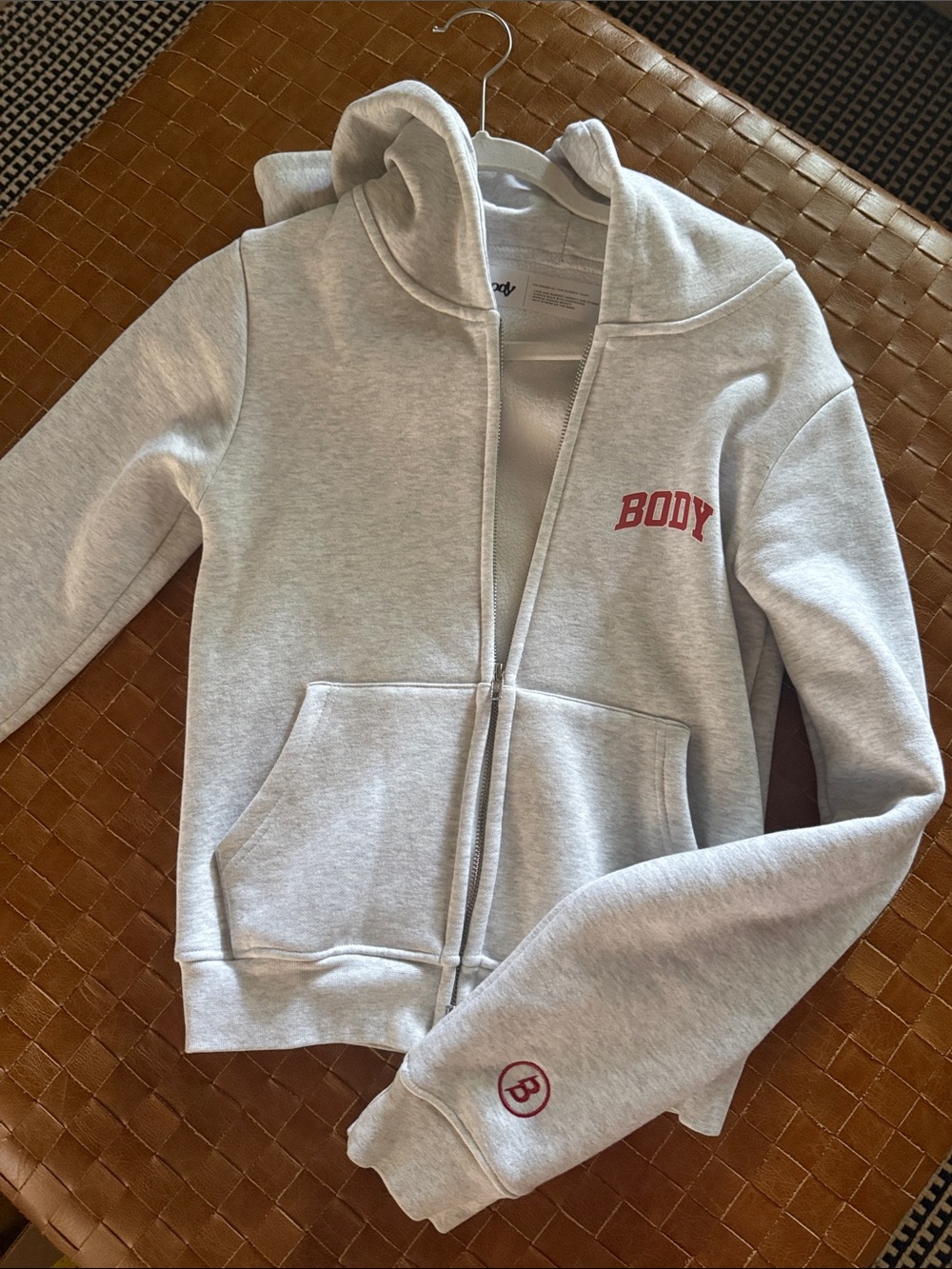 BODY by Raven Light Gray Zip Hoodie with Red Logo